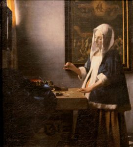 "Woman Holding a Balance" by Johannes Vermeer